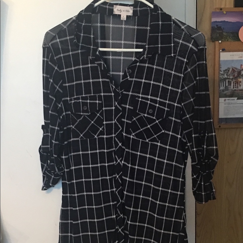 Blue and white button up shirt.